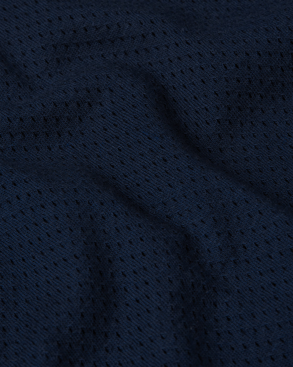 Close up detail of the mesh fabric on the arc longsleeve in navy