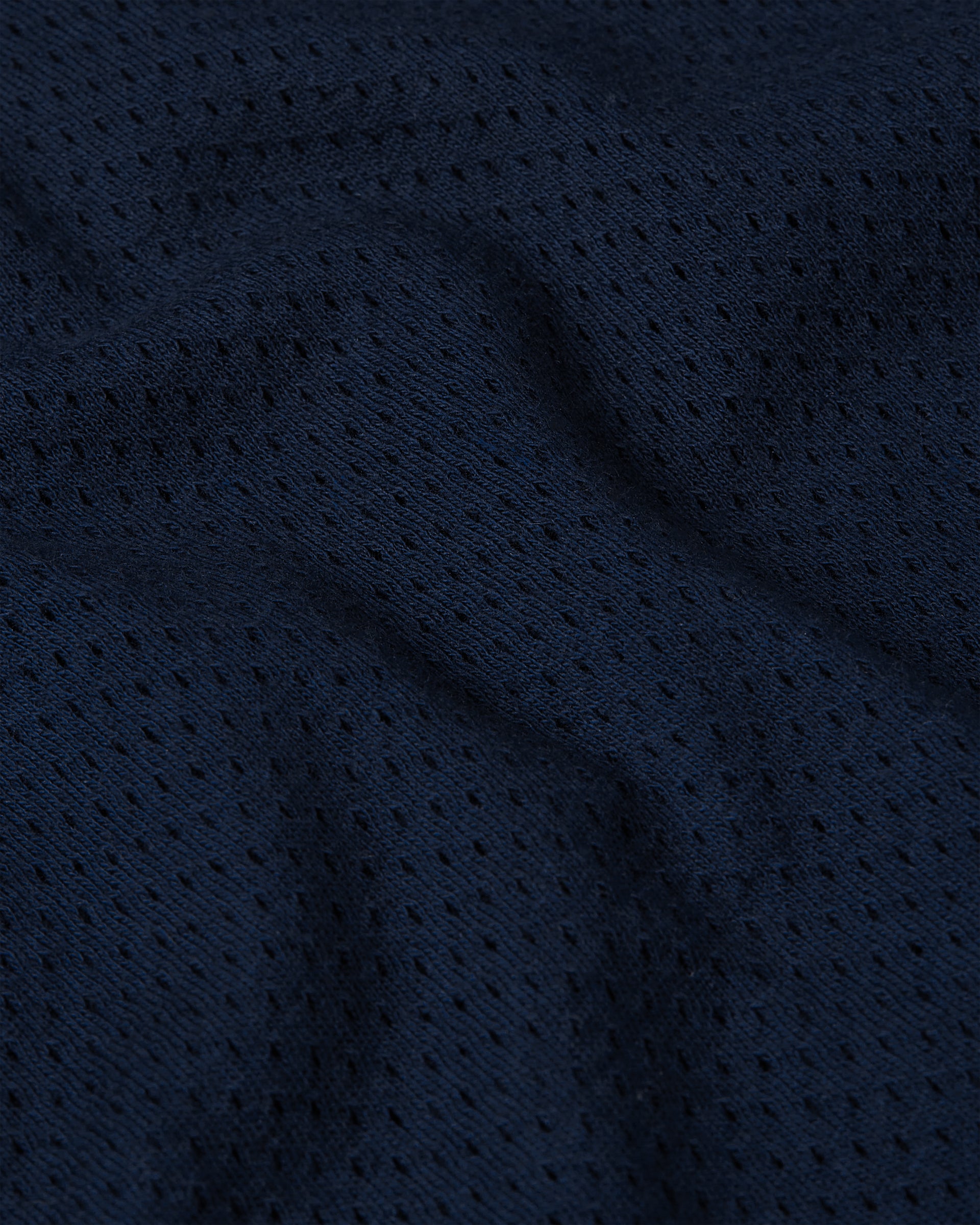 Close up detail of the mesh fabric on the arc longsleeve in navy